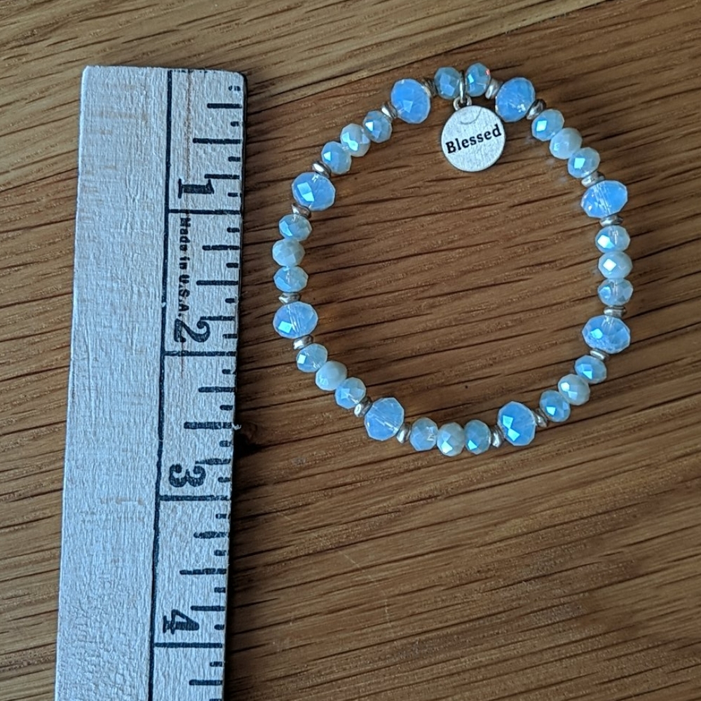 Stretch bead stretch bracelet with "blessed" tag